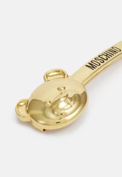 MOSCHINO Brooch - Otros Accesorios - Shiny Gold-Coloured 9 MOSCHINO Brooch - Otros Accesorios - Shiny Gold-Coloured -Tienda De Moda Femenina c8823b82641b4390b5275fcf2557cf72
