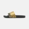 EA7 Emporio Armani Sport Tape Slide Unisex - Sandalias Planas - Black/Gold 1 EA7 Emporio Armani Sport Tape Slide Unisex - Sandalias Planas - Black/Gold -Tienda De Moda Femenina e5ad2d85228f4413b3f8c6515bf50446